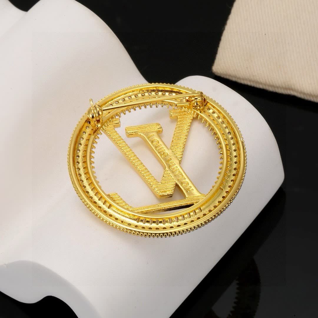 Louis Vuitton Gold Tone Logo Brooch with Rhinestones